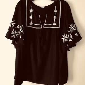Black Swing top with white embroidery